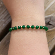 Bratara cu snur, 10 bilute striate 2mm din aur 14k, Jad Verde, mana