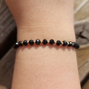 Bratara cu 10 bilute striate si cristale negre,model