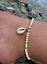 Brățară de picior cu 4 bilute din aur 14kt cu piatră Howlite cristal și talisman Scoica de Mare